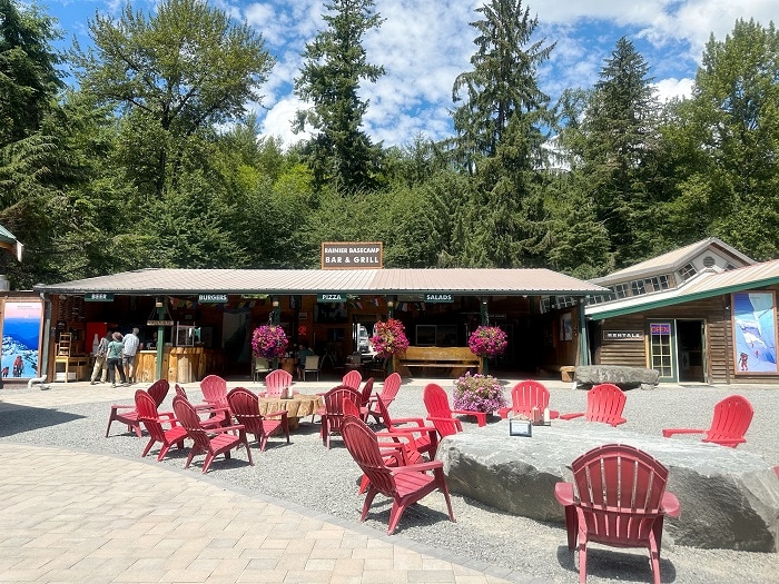 Red chairs and seating area at Rainier BaseCamp Bar and Grill