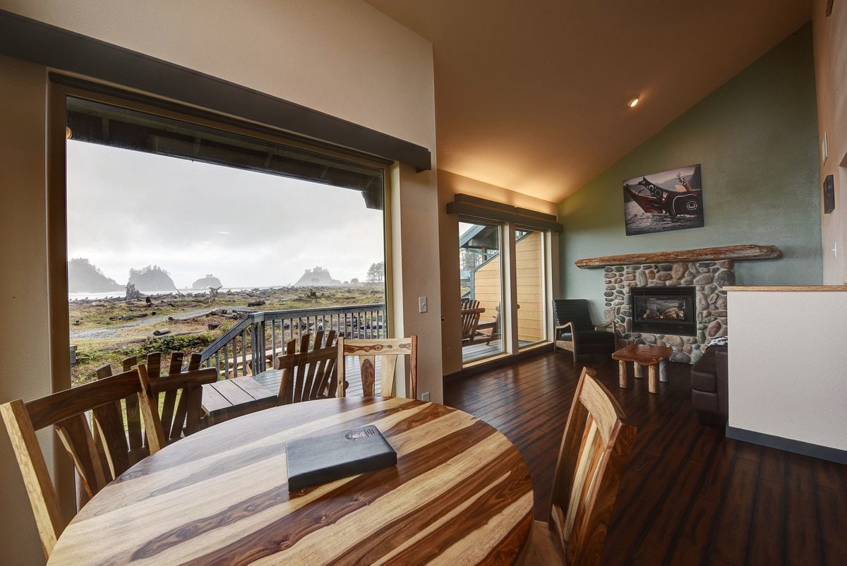the inside of a deluxe cabin at Quileute Oceanside Resort with native art on the wall