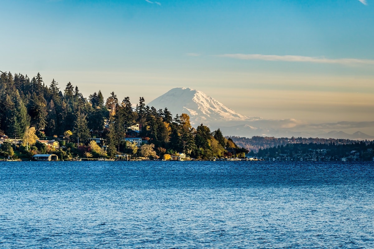 a serene view of Lake Washington and Seward Park, one of the best places to see Mount Rainier on a clear day