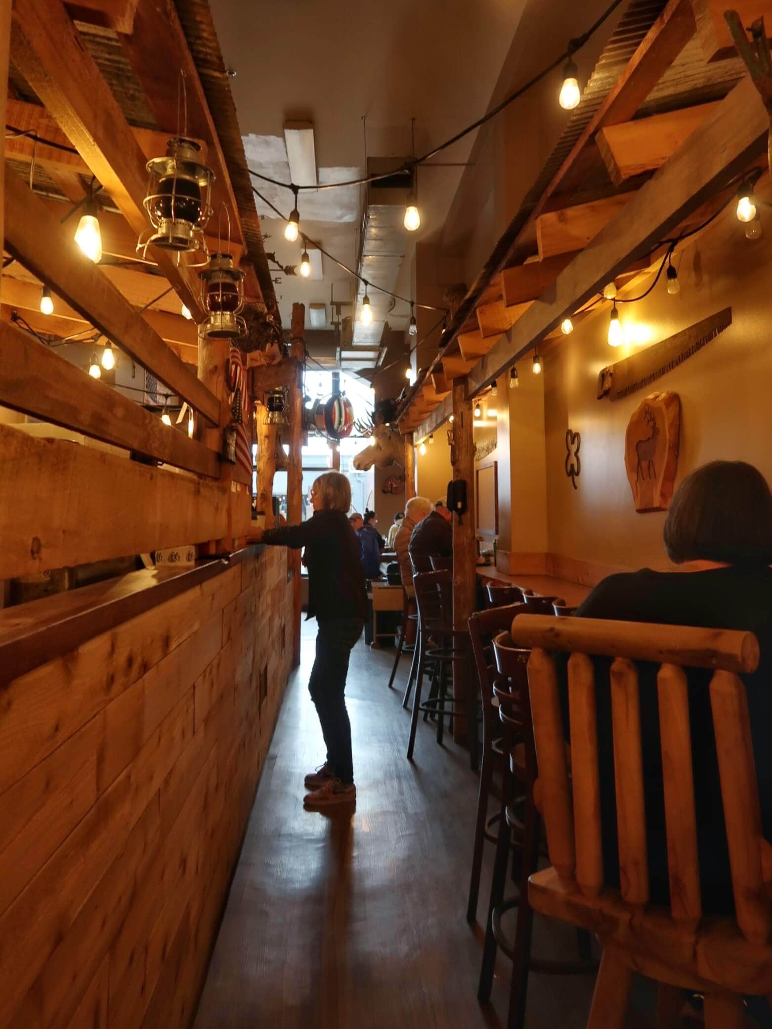 How to spend a day in Port Angeles? Grab a coffee at Great Northern Coffee Bar where the ambiance is glowing from hanging string lights and warm wood decor.